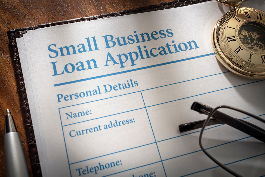 Small business loan application form on an office desk – InsideSources